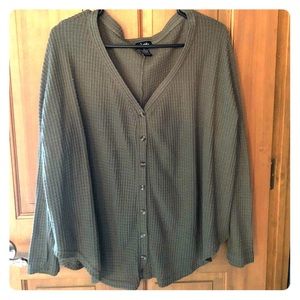 Longsleeved olive colored shirt